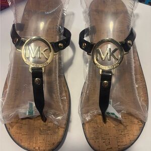 Michael Kors Black Sandals with Gold Accents size 8